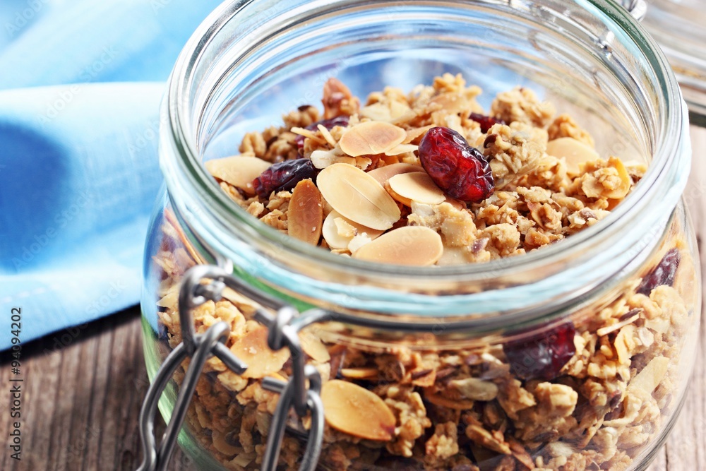 Granola with nuts,seed mix and dried cranberries. Selective focus, toned image Granola with nuts,seed mix and dried cranberries. Selective focus, toned image