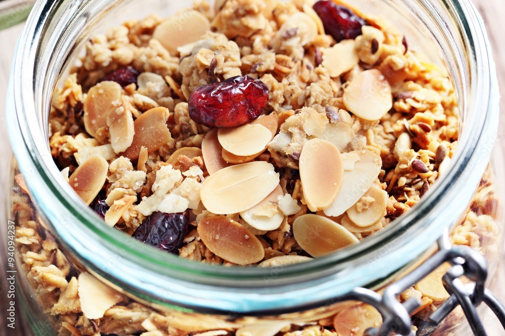 Granola with nuts,seed mix and dried cranberries. Selective focus, toned image Granola with nuts,seed mix and dried cranberries. Selective focus, toned image