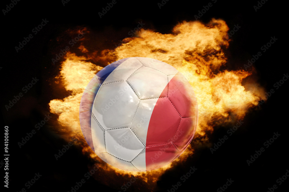 Fototapeta premium football ball with the flag of france on fire