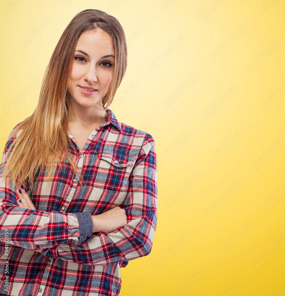 Portrait of young woman standing with arms crossed Portrait of young woman standing with arms crossed
