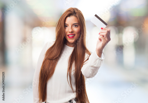 a young woman shopping with her credit card