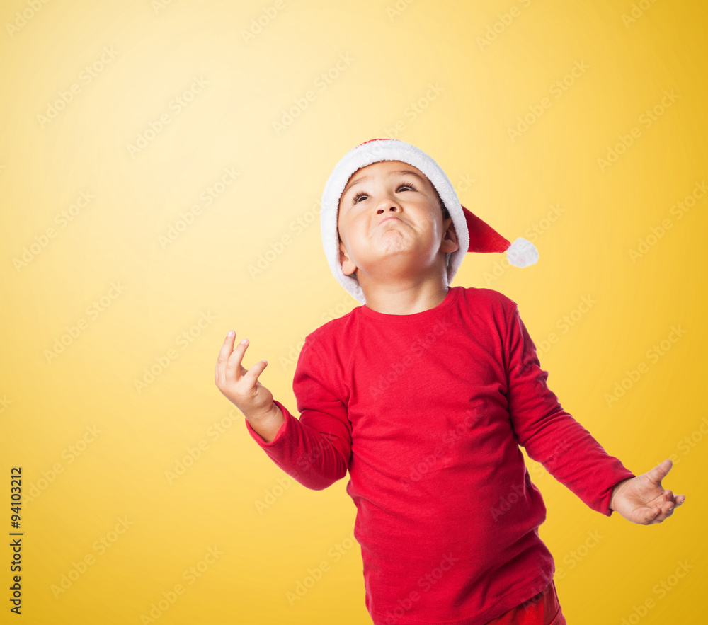 portrait of a little boy with pensive gesture