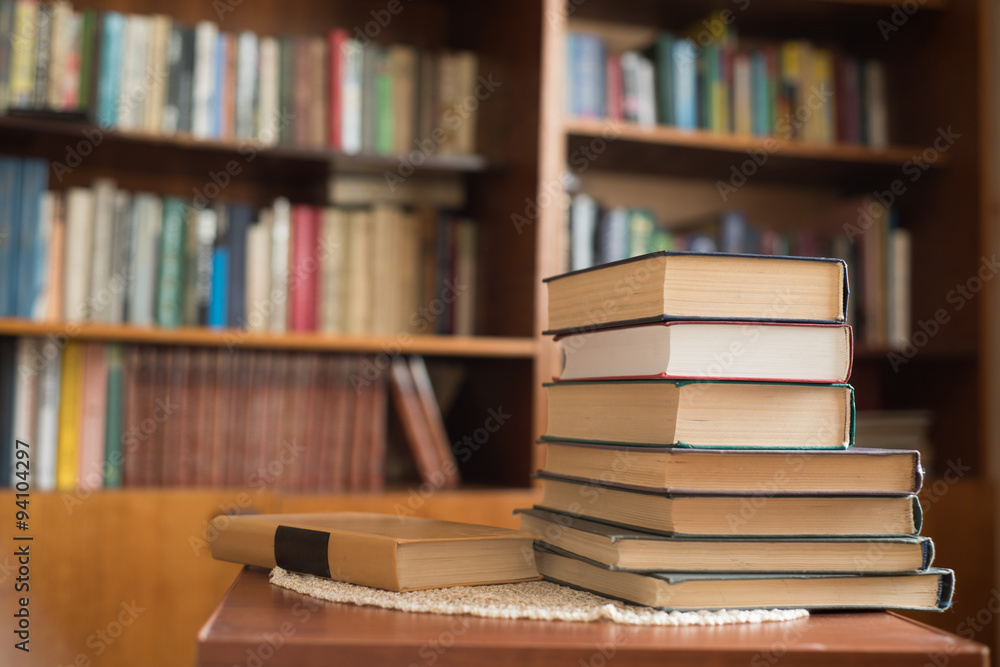 Fototapeta premium Book Stack and Books on Bookshelves