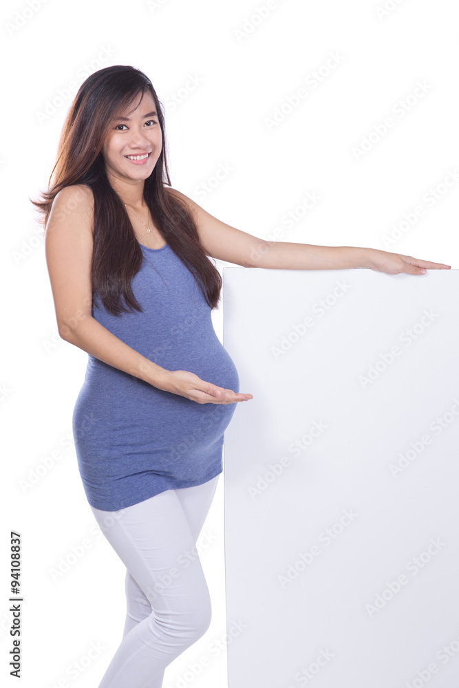 Asian pregnant woman with a blank whiteboard, isolated Asian pregnant woman with a blank whiteboard, isolated