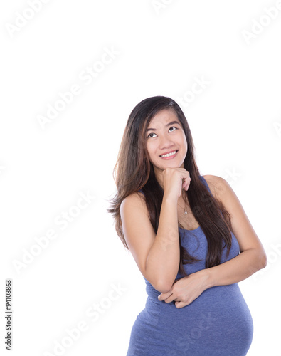 Asian pregnant woman look up and think