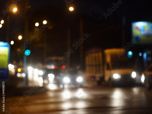 Defocused image of night traffic on city street