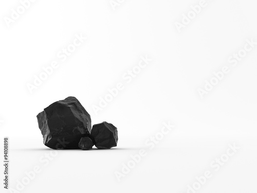 Handful of coal on white background
