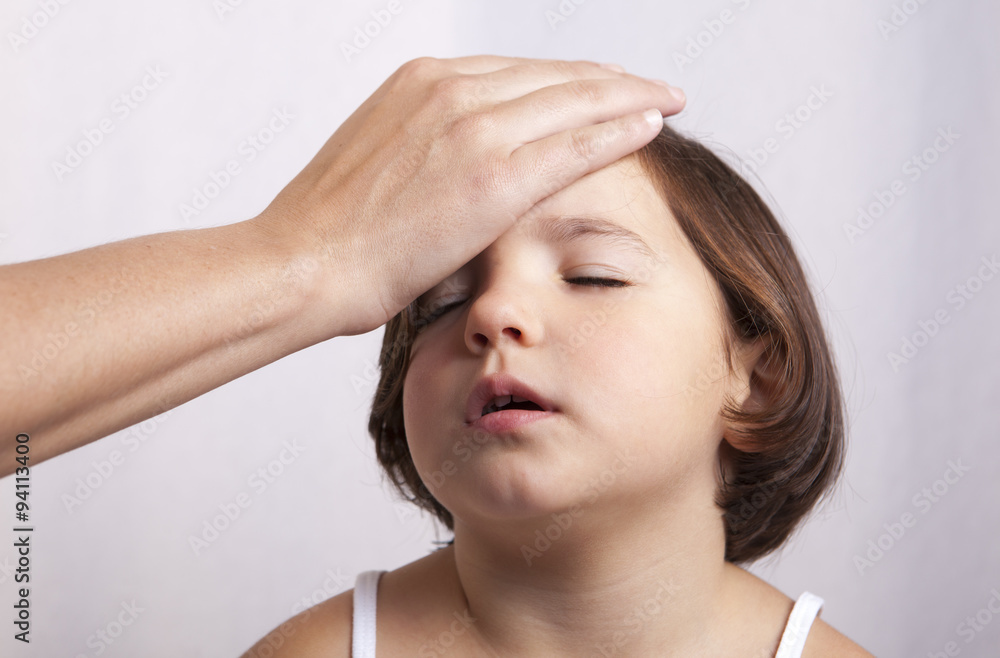 Fototapeta premium Measuring temperature with hand