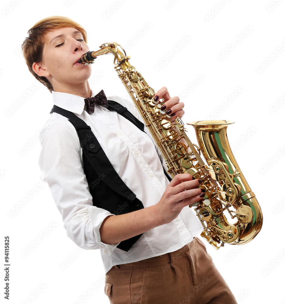 Fototapeta premium Young woman professionally plays jazz on saxophone in front of white background