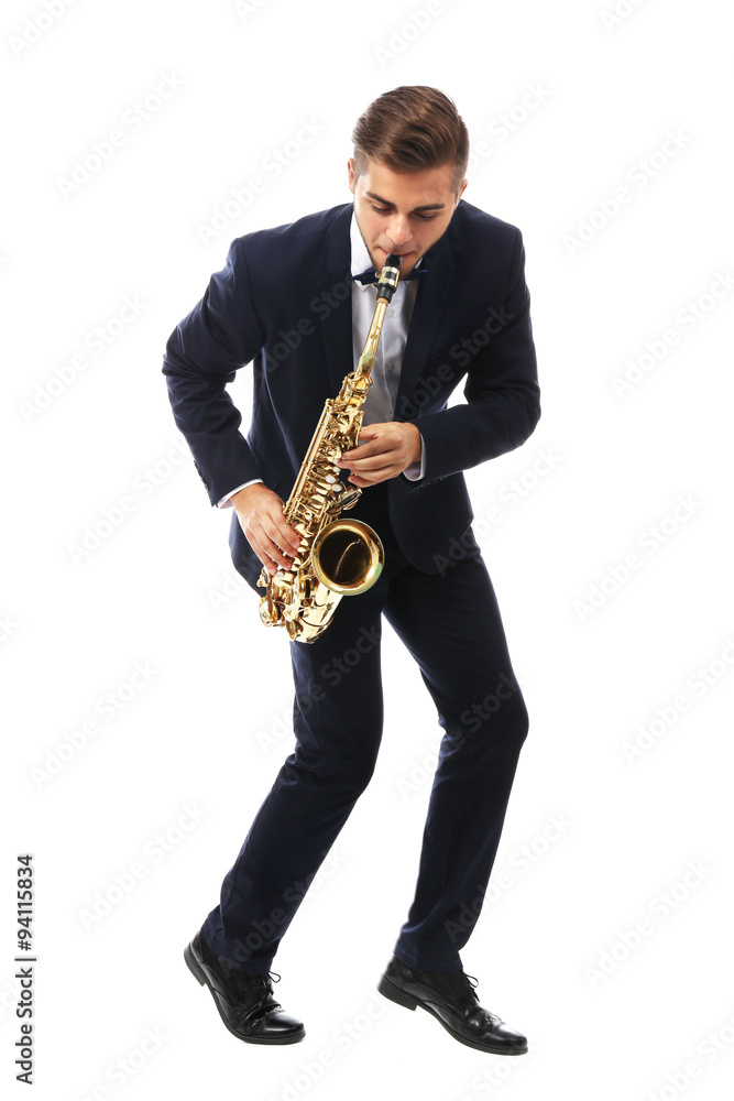 Naklejka premium Elegant happy saxophonist plays music on sax on white background