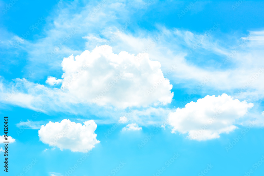 White puffy clouds on summer blue sky background White puffy clouds on summer blue sky background