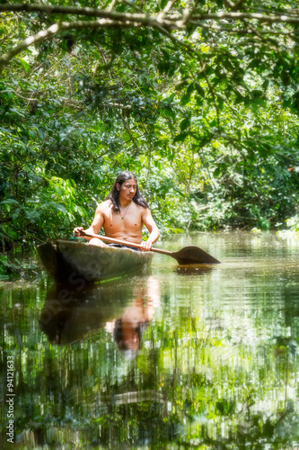 An indigenous Indian tribe in Ecuador's Putumayo region, deep in the Amazon rainforest, performing a traditional ritual.