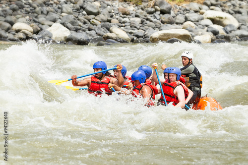 Experience the thrill of white water rafting with our team in the stunning Sangay National Park on the Pastaza River,basked in bright sunlight.