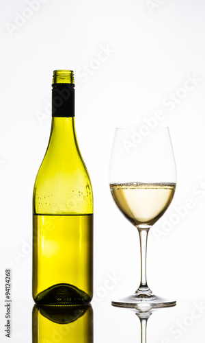 wine glass and bottle of white wine
