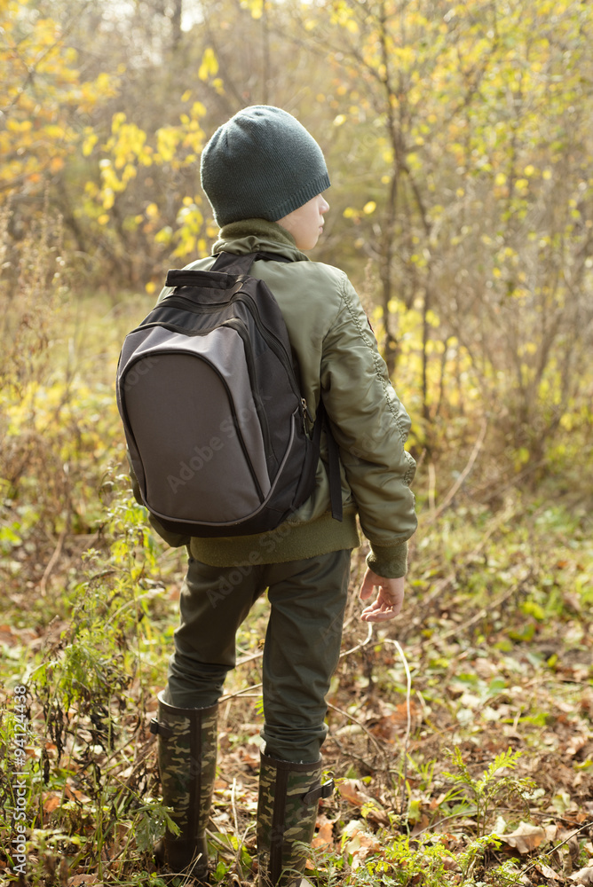 Boy-traveler with a backpack
