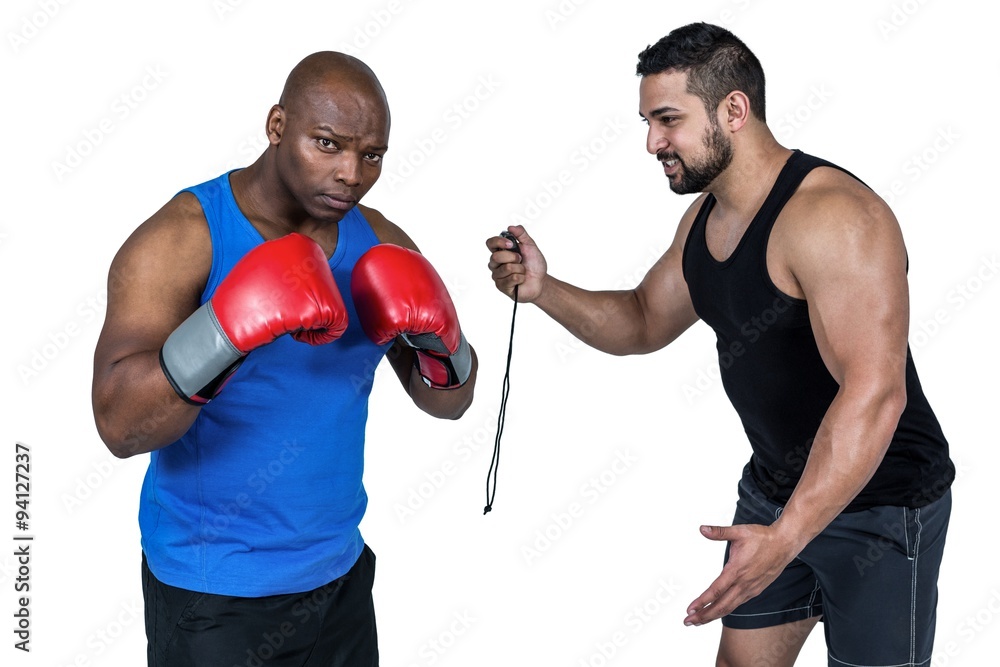 Strong friends using kettlebells together Strong friends using kettlebells together