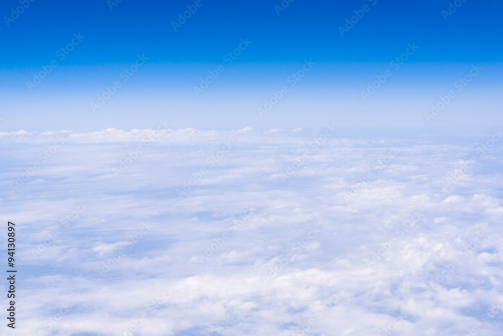 skyline view above the clouds from air plane skyline view above the clouds from air plane