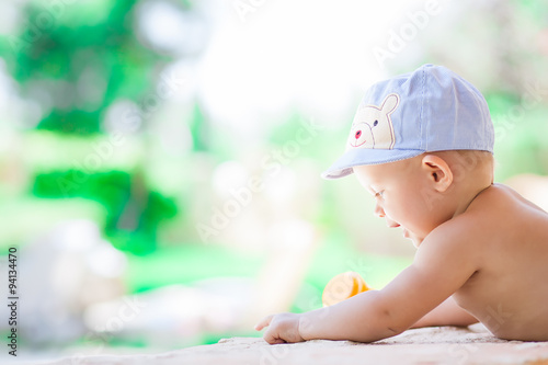 Picture of baby playing outdoors, love and happiness concept