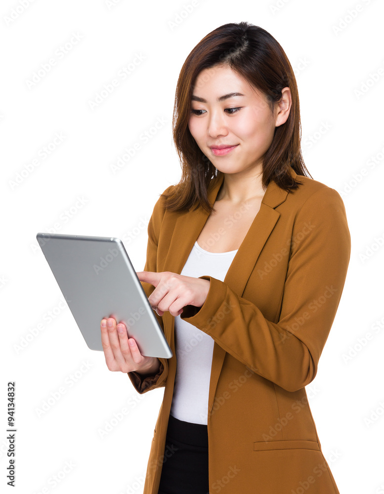 Young Businesswoman use of the tablet pc Young Businesswoman use of the tablet pc