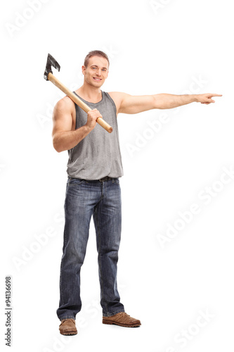 Man carrying an axe and pointing with his hand