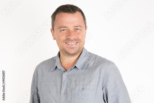 Portrait of a mature handsome  man smiling photo
