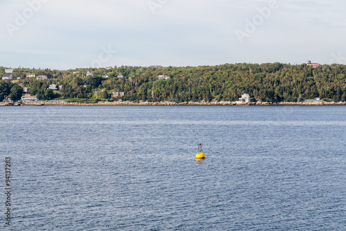 Yellow Channel Marker Along Canadian Coast