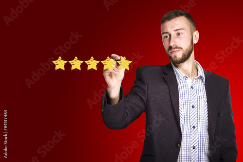 Businessman draws stars