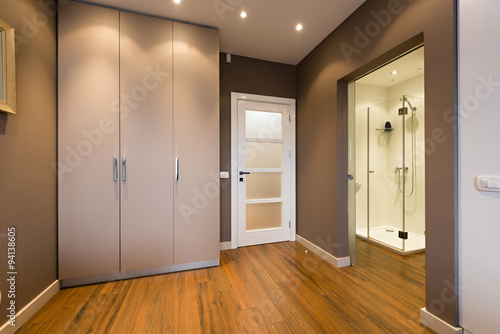 Modern anteroom interior with a view to a bathroom