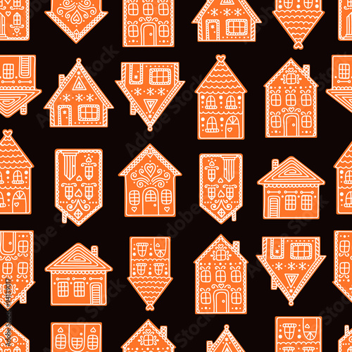 Gingerbread houses. Seamless pattern with gingerbread house. Cute christmas background. Brown colors.
