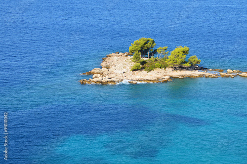 Small Island in Blue Sea