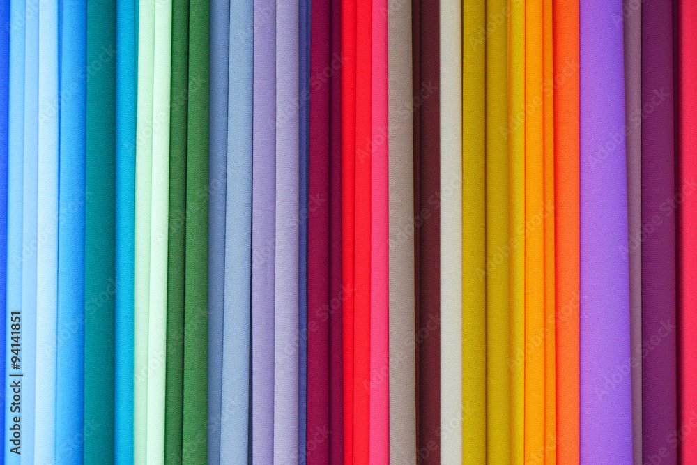 Repeated colours. Colourful fabric on display at market in Malaysia. Repeated colours. Colourful fabric on display at market in Malaysia.