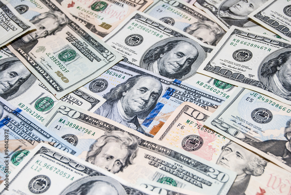 heap of different american dollars heap of different american dollars