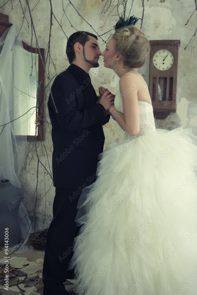 Bride and groom in vintage room