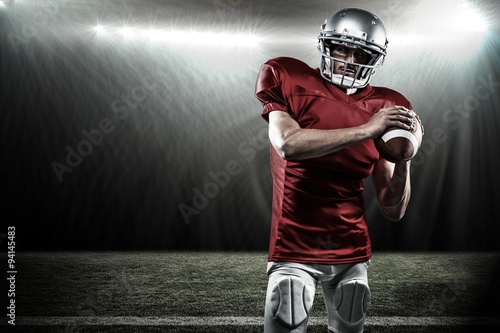 Composite image of confident american football player © vectorfusionart
