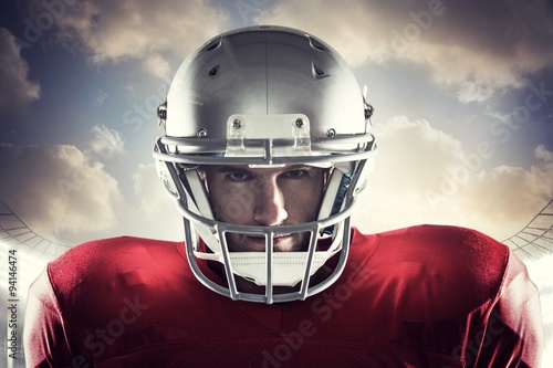 Composite image of close-up portrait of american football player
