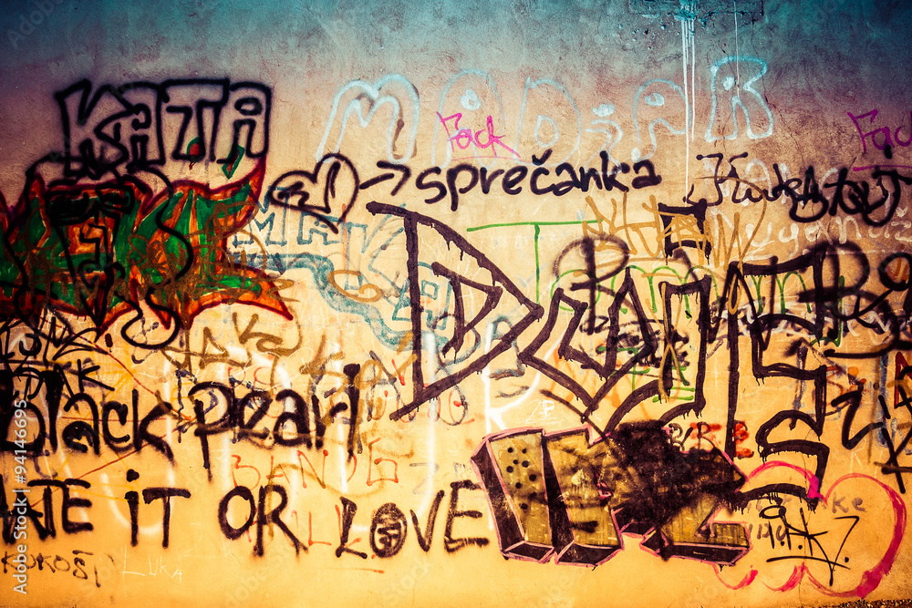 Fototapeta premium Ugly graffiti wall, urban art