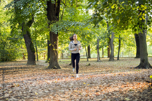 Sporty woman jogging in park