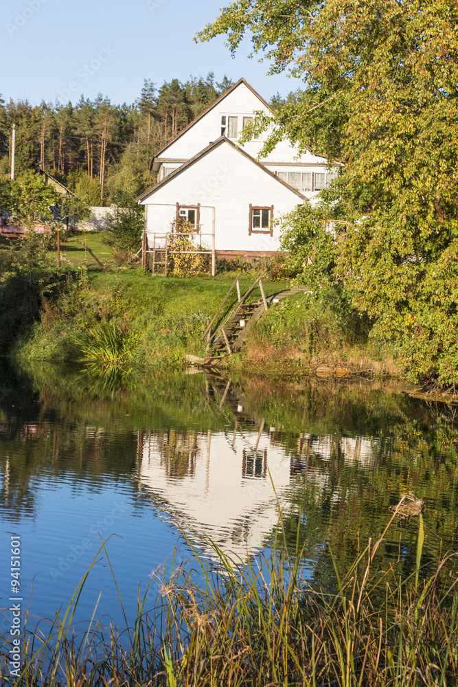 Obraz premium Landscape with a white house