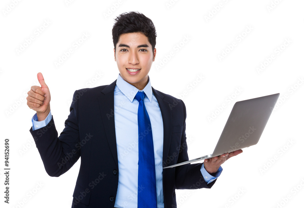 Businessman hold with laptop computer and thumb up Businessman hold with laptop computer and thumb up