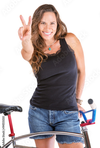 Girl Gesturing Victory with Her Bike
