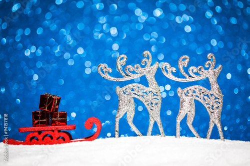 Wallpaper Mural christmas ornament in snow on glitter background Torontodigital.ca