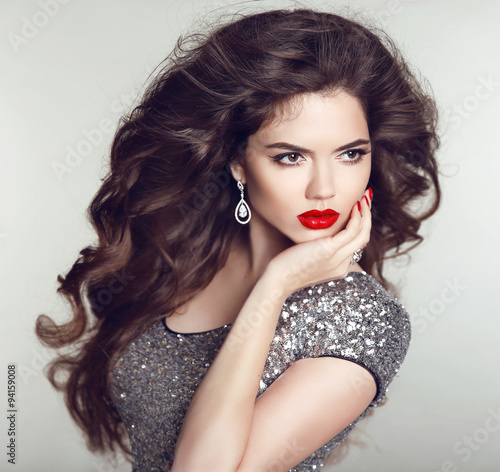 Hairstyle. Luxury jewelry. Beauty fashion girl model portrait. R