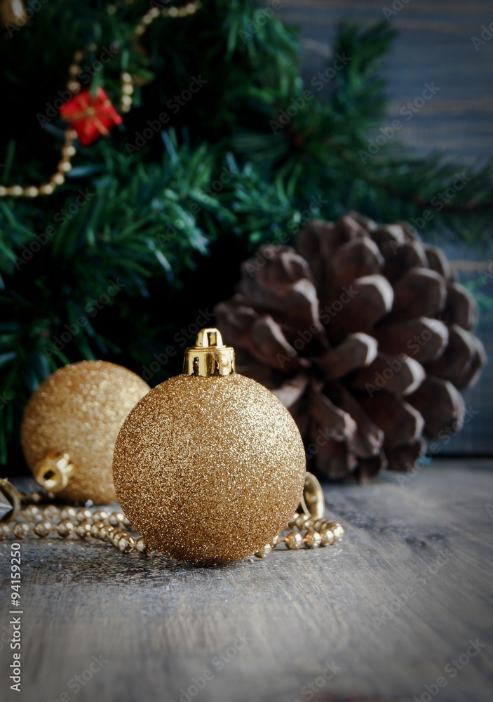 Christmas decorations on a background of trees and cones Christmas decorations on a background of trees and cones