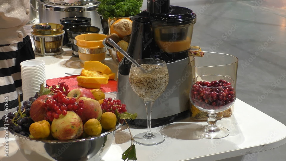 Promoting modern fruit and vegetable juice maker by giving freshly made juice to people for tasting Promoting modern fruit and vegetable juice maker by giving freshly made juice to people for tasting