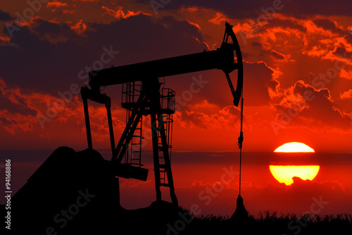Oil Pump on red sunset