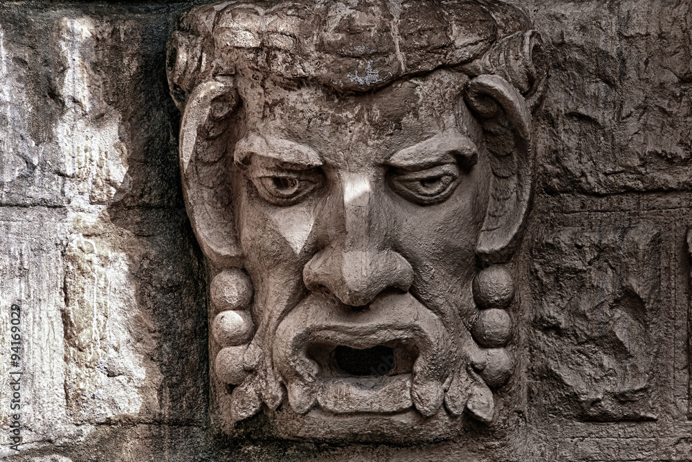 Stone bas-relief a kind of a head of a demon