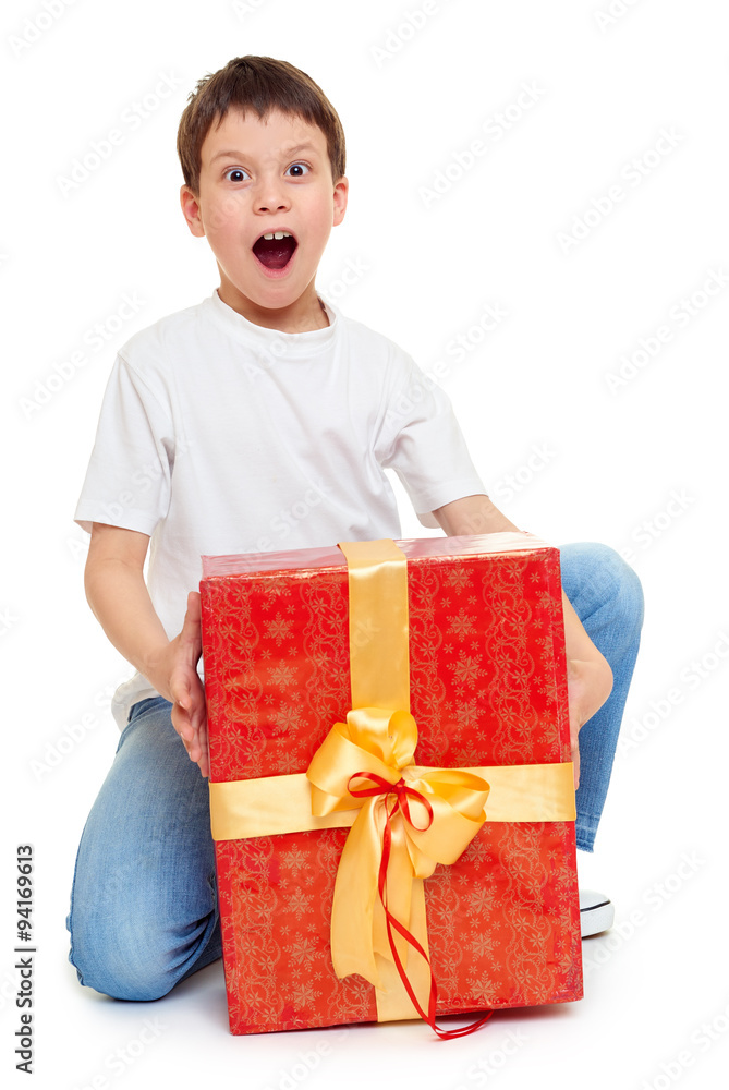 boy with red gift box and golden bow - holiday object concept isolated boy with red gift box and golden bow - holiday object concept isolated