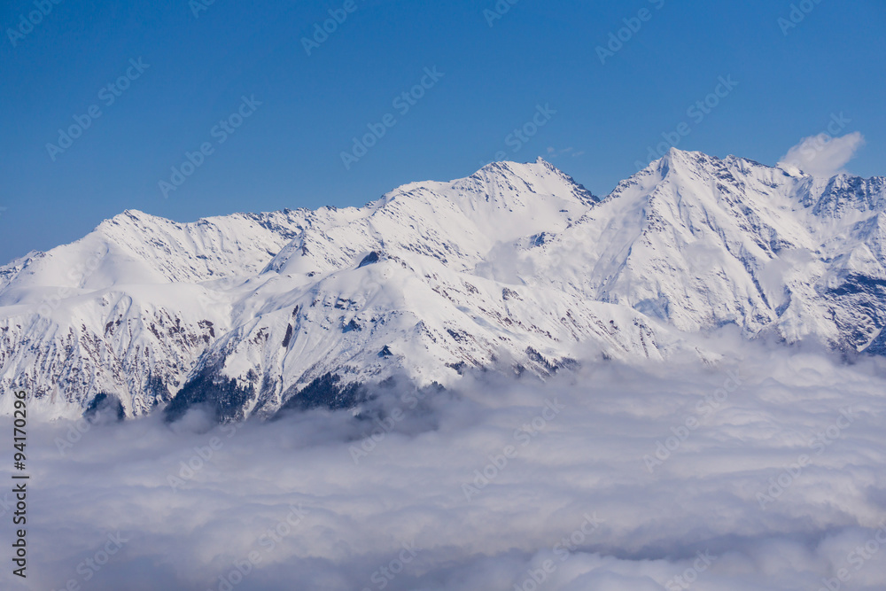 View on mountains and blue sky above clouds, Krasnaya Polyana