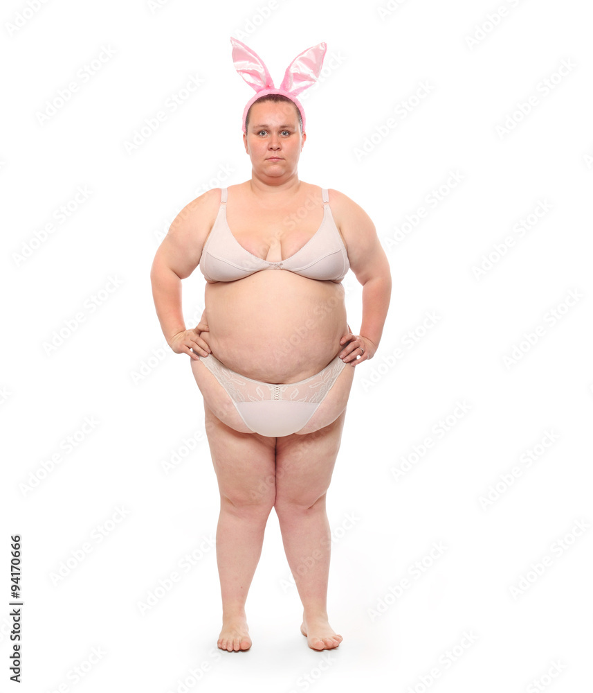 Funny picture of a plus size woman in bikini and rabbit ears. Great for  humorous easter greetings. Stock Photo | Adobe Stock