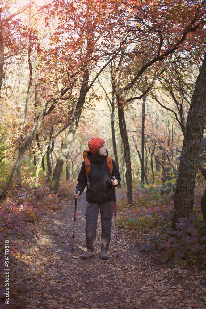 Fototapeta premium The girl with the backpack.